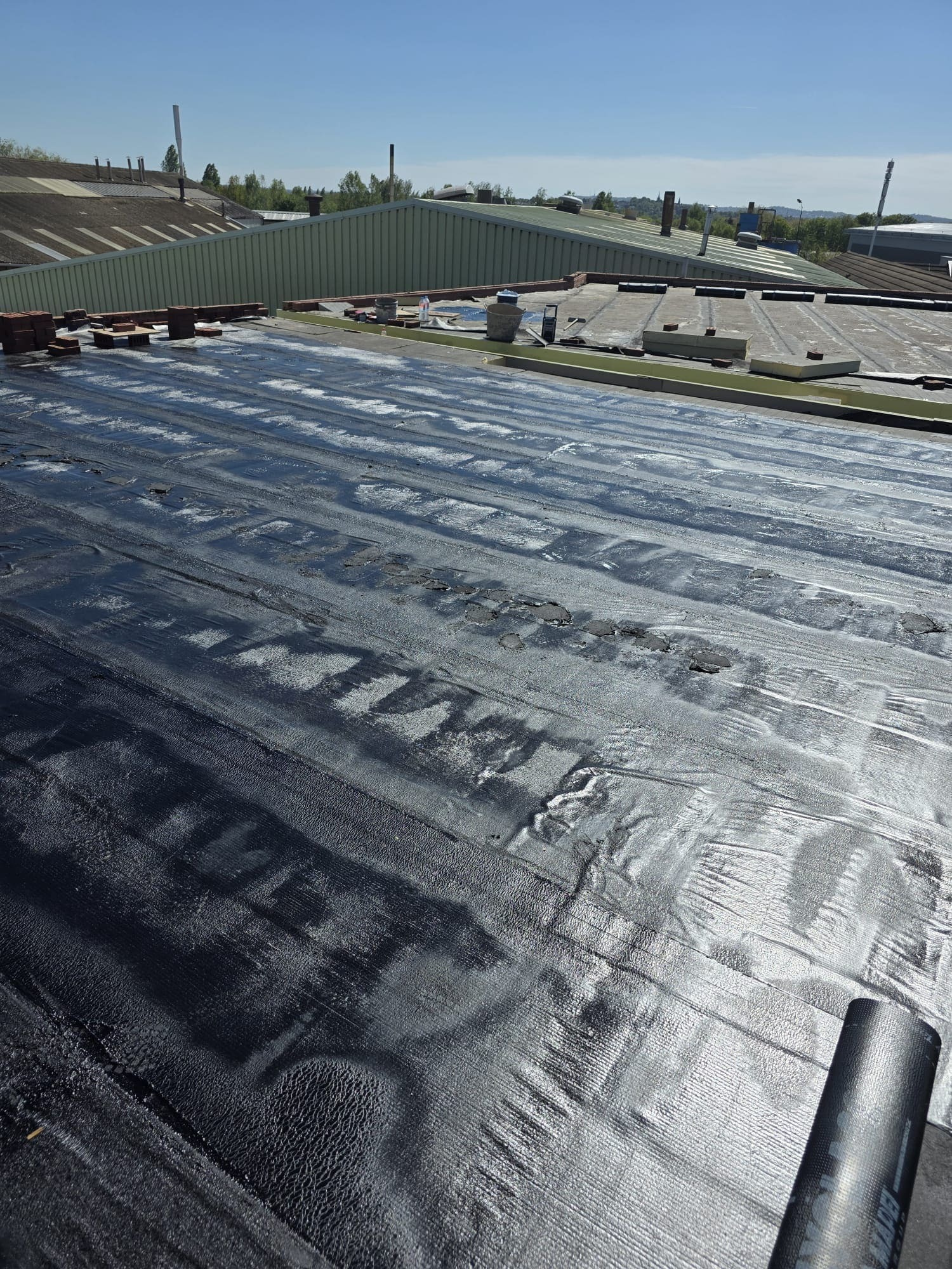 Roof coatings and refurbishment